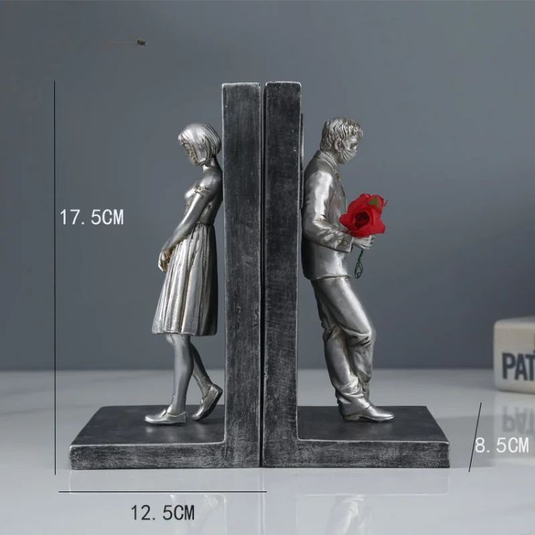 Silver book stand, dimensions shown.