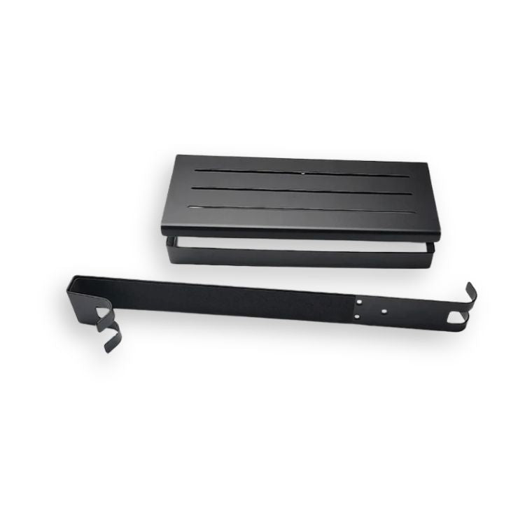 Flat lay of black shower shelf parts for assembly.