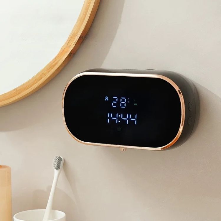Wall-mounted sensor soap dispenser.