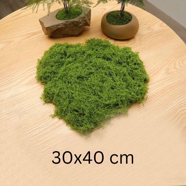 30x40 cm fake moss patch placed on a wooden table, perfect for plant decor and craft displays.