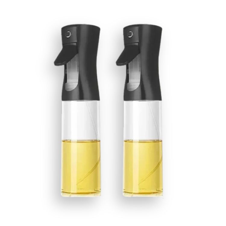 Two black oil sprayer bottles placed together, filled with yellow cooking oil.