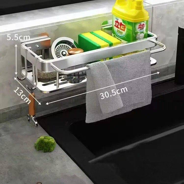 Sink drain rack with measurements and sponges.