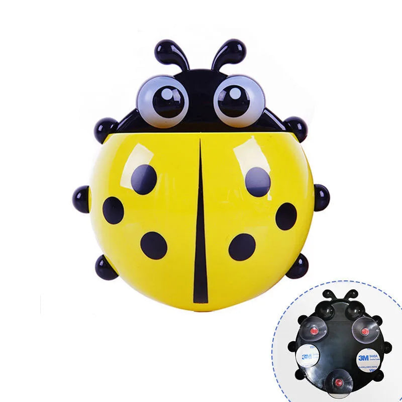 A single yellow ladybug toothpaste holder.