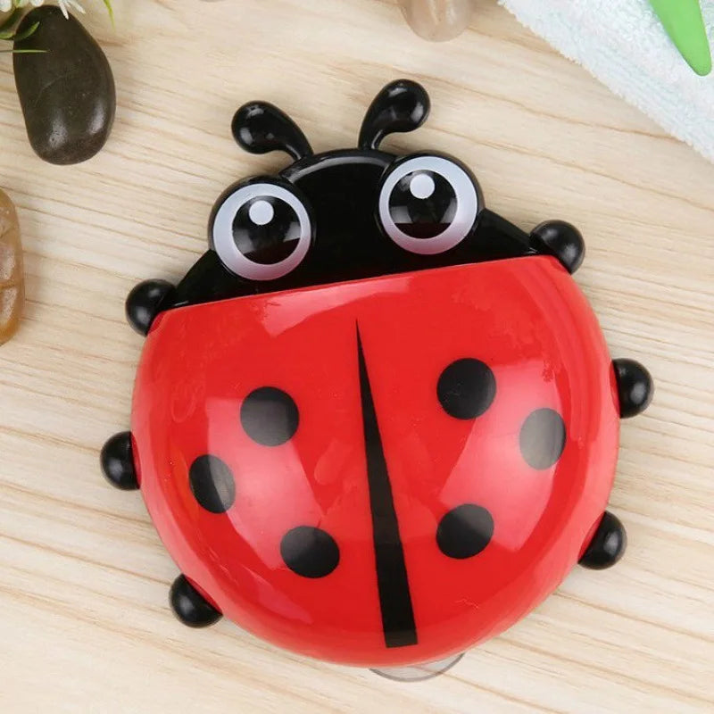 A single red ladybug toothpaste holder.