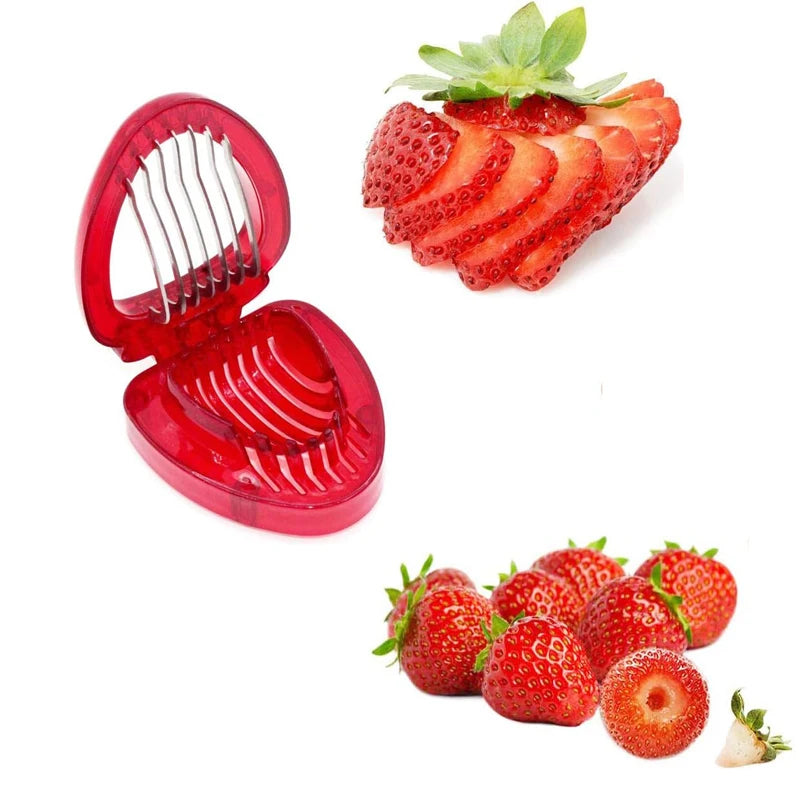 Hand placing a strawberry into a red, heart-shaped slicer on a marble board.