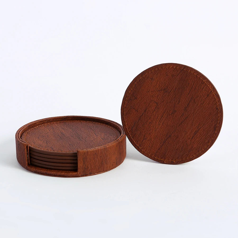 Six brown round wood-grain coasters with holder, one separate.
