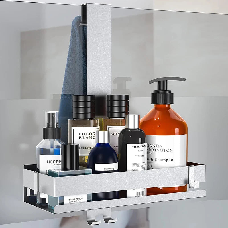 Single silver shower shelf with assorted shower products.