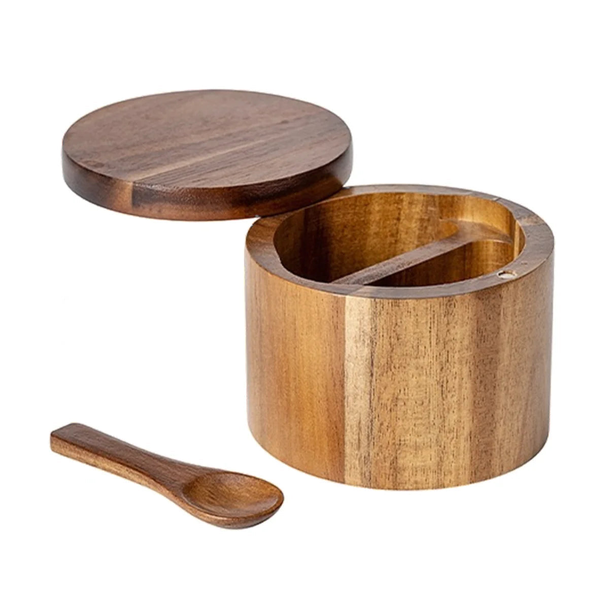 Wooden salt cellar with lid and spoon placed beside.