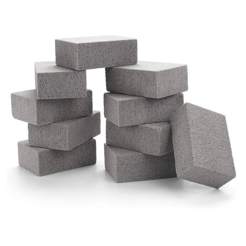 Stack of multiple grill cleaning brush blocks.