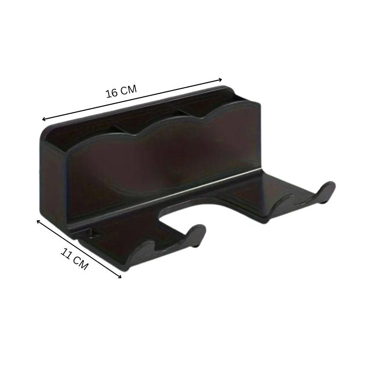 Black hair dryer holder wall mount with sections.