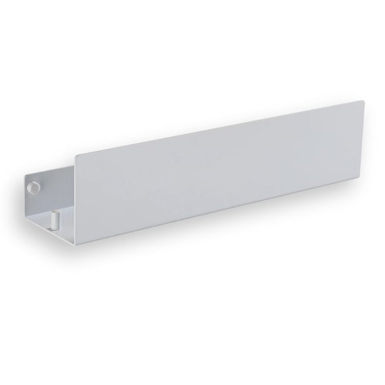 Matte white bathroom organizer shelf angled from the side.