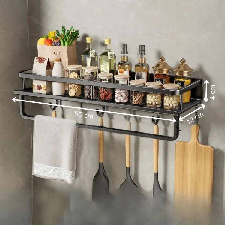 Spice rack organizer fully loaded with jars, utensils, and cutting boards.