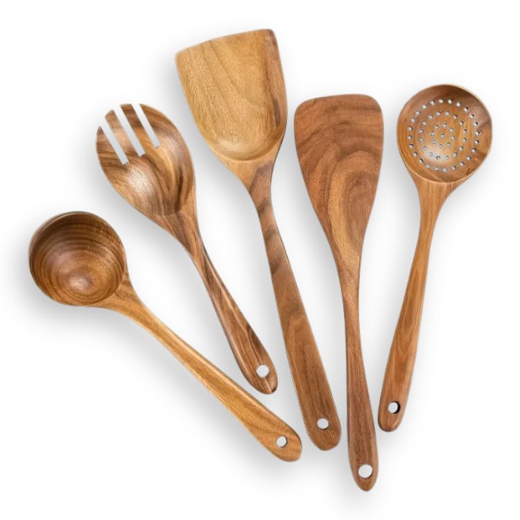 Set of six wooden spoons for cooking displayed on white background.
