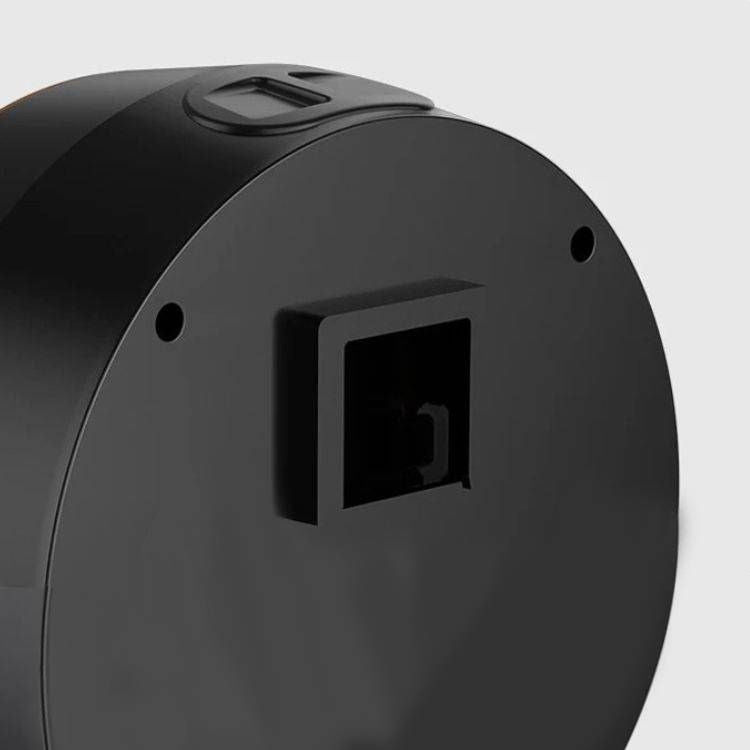 A black smart soap dispenser with a digital display, showing its back
