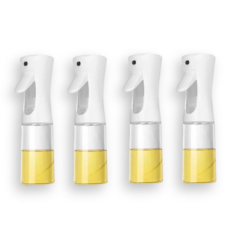 Four white oil sprayer bottles in a row, each containing cooking oil.