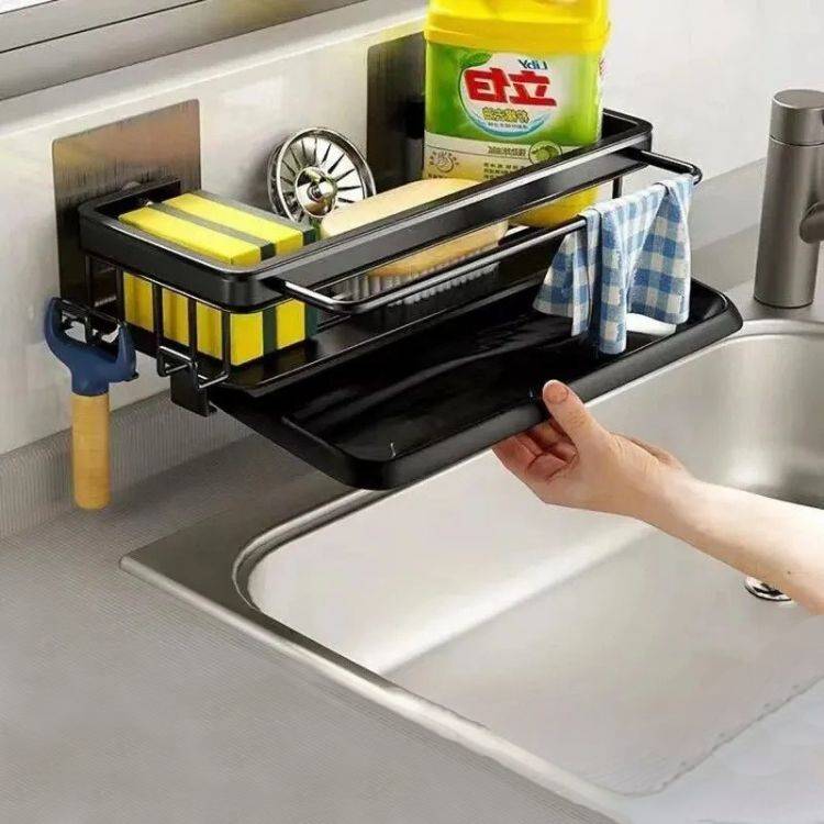 Pull-out sink drain rack above kitchen sink.