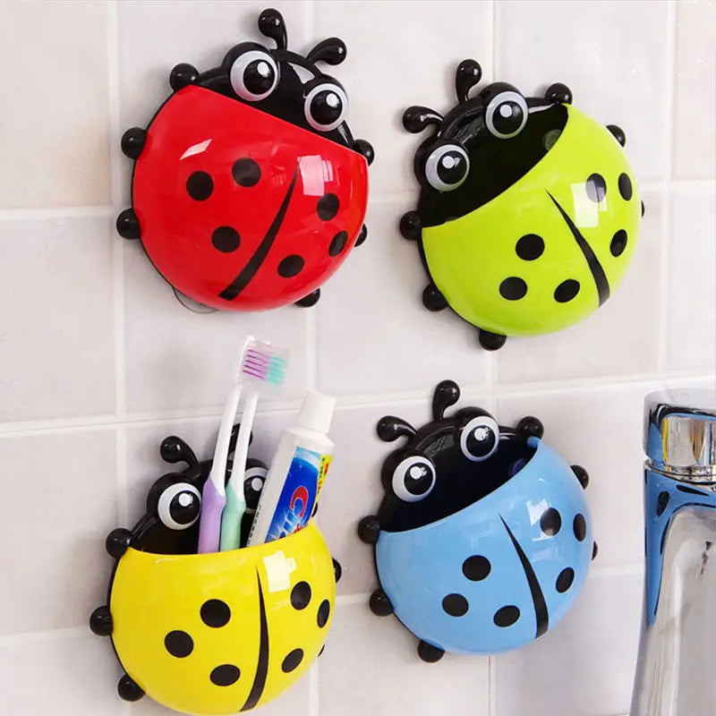 Four ladybug-shaped toothpaste holders