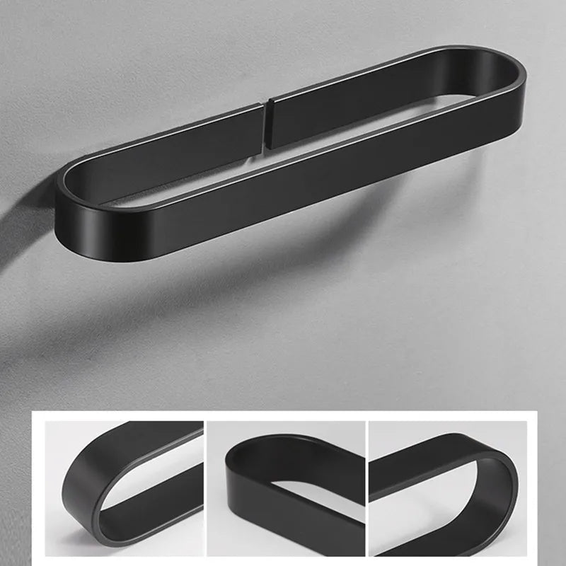 Black kitchen towel rack on a gray wall, with heart and curved configurations shown below.