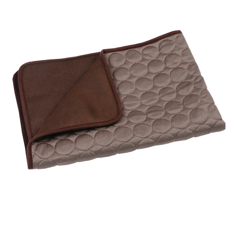 Brown dog cooling mat folded to show texture.