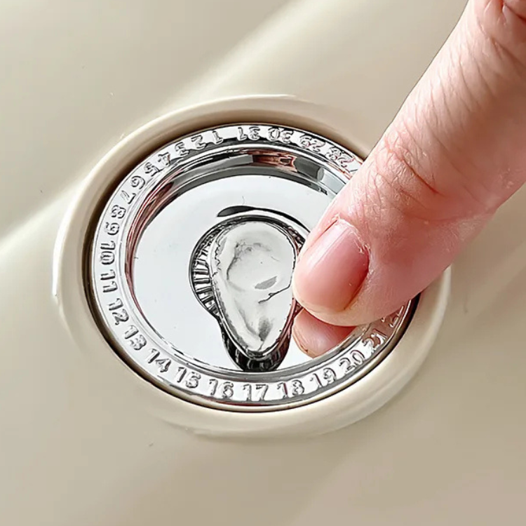 Close-up of date dial on egg rack for fridge lid, with a finger adjusting the freshness tracker.