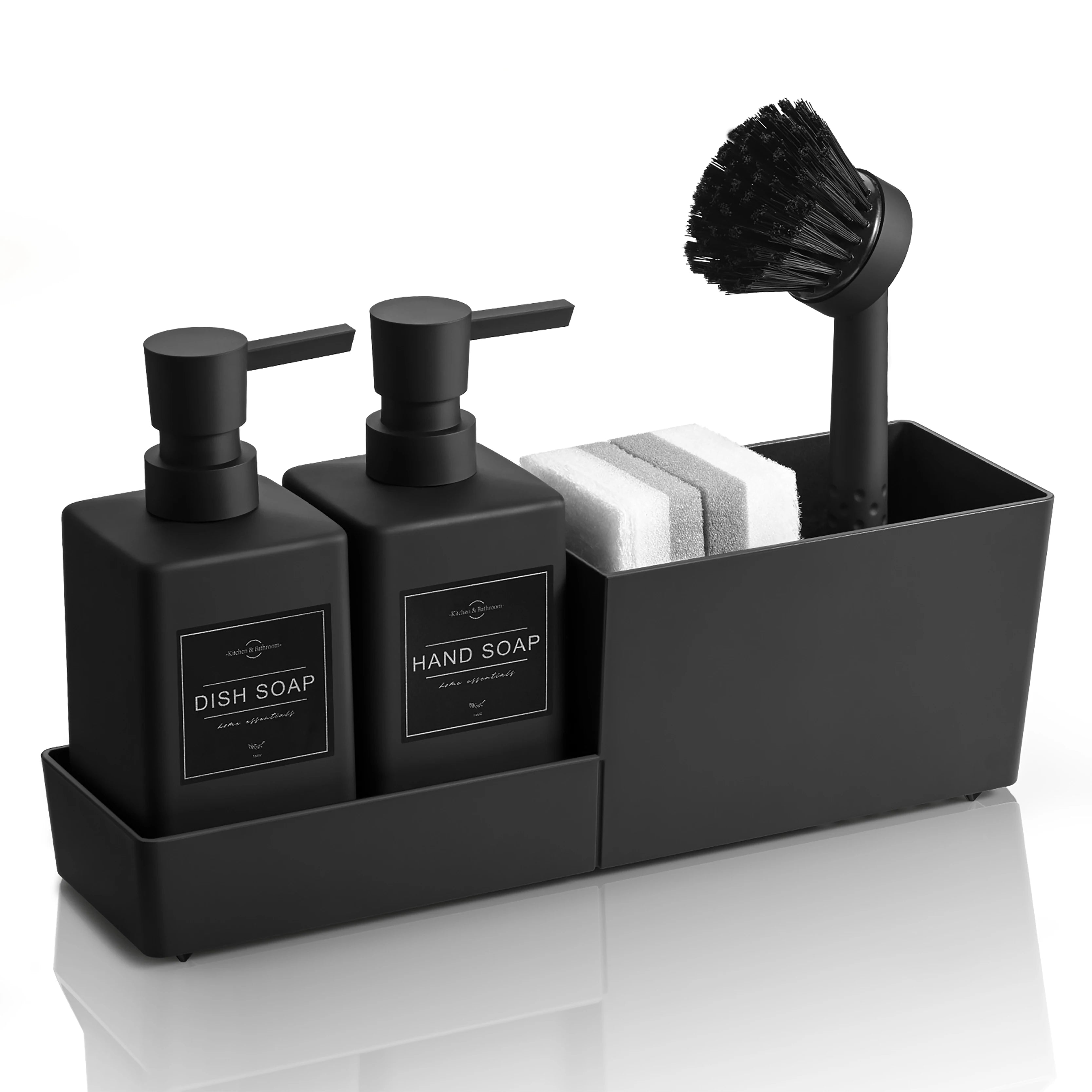 Black kitchen soap dispenser set with scrub brush and sponge holder on reflective surface.