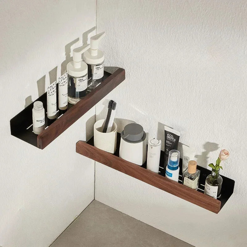 Two floating wood shelves with toiletries and toothbrushes in a bathroom corner.