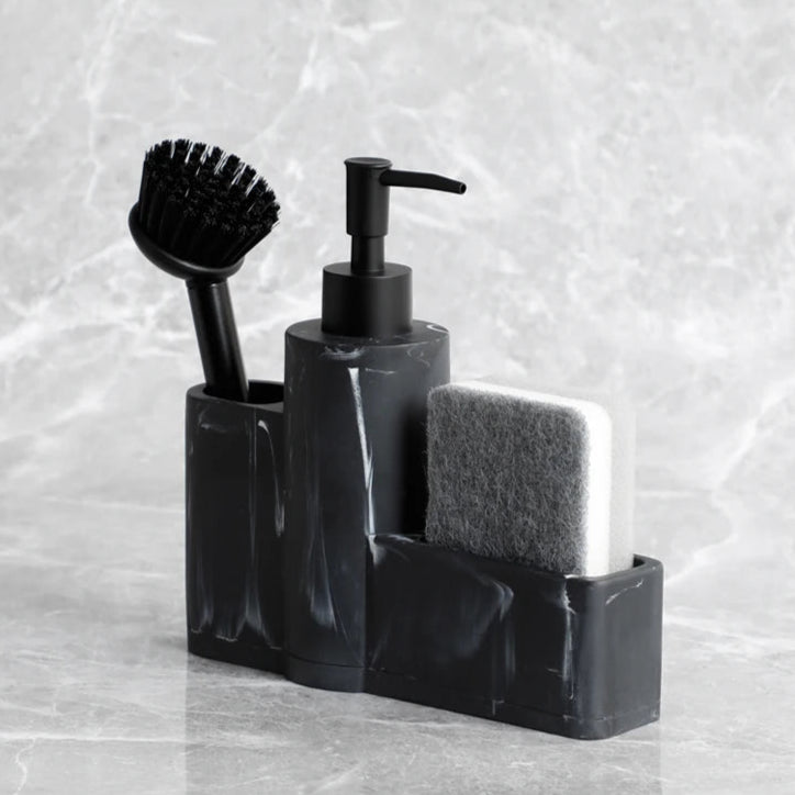 Dark marble dish soap dispenser viewed from the side.