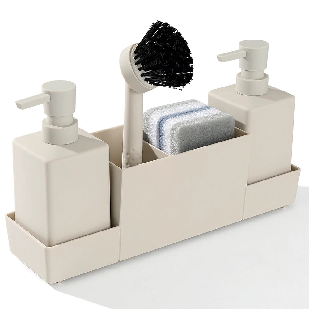 Beige sink caddy with dispensers, sponge slots, and vertical brush stand.