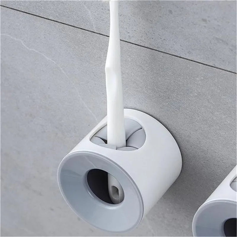 Wall-mounted toothbrush holder with grey circular top installed in bathroom corner