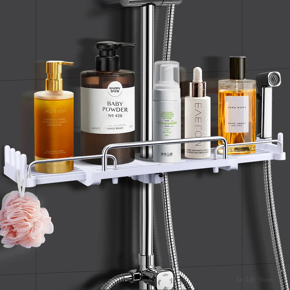 White shower shelf bathroom with skincare bottles and sponge.
