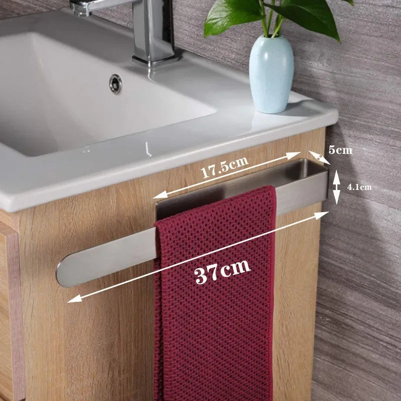 Adhesive towel ring on cabinet with red towel, 37cm.