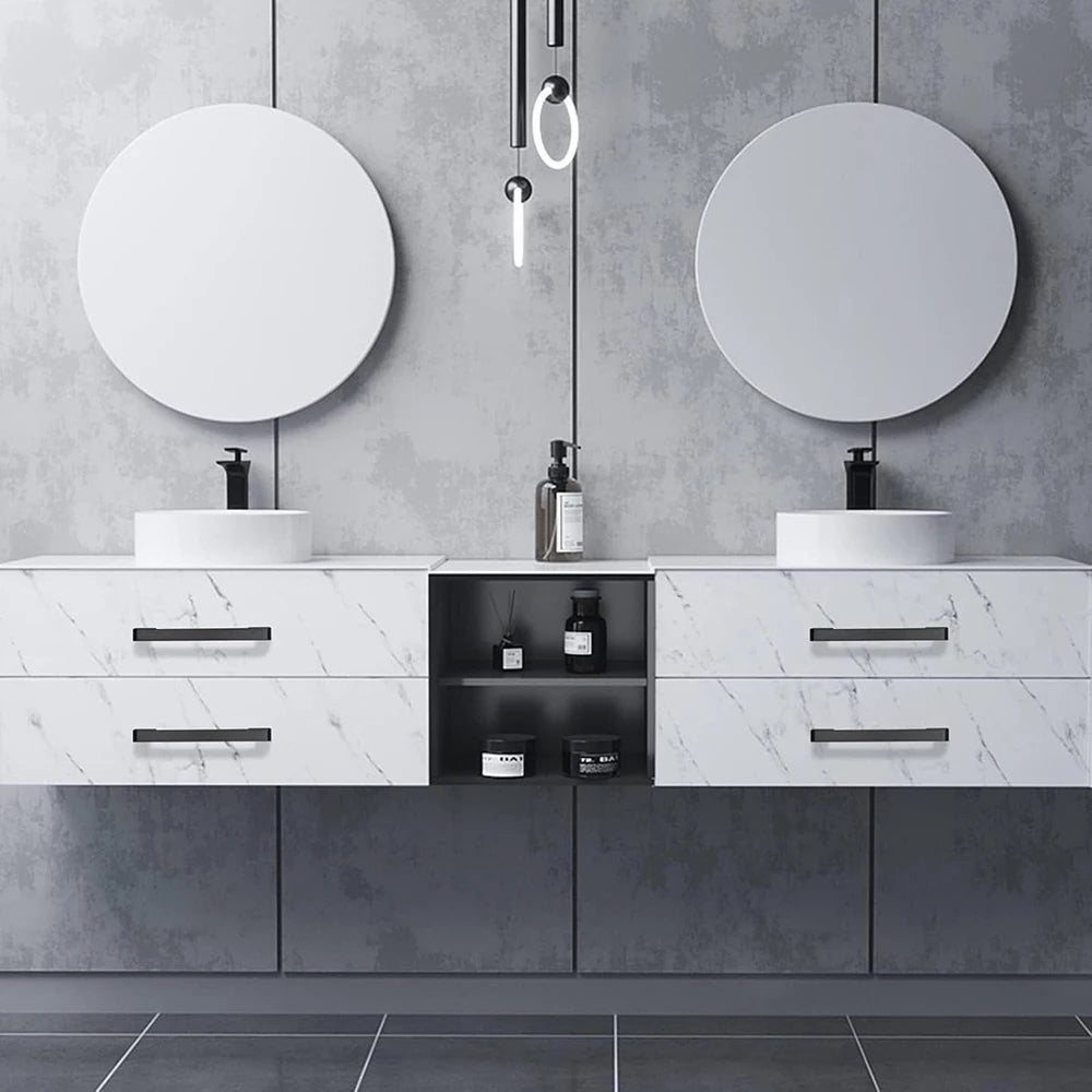 Modern double sink vanity with white cabinets and black kitchen cabinet knobs.