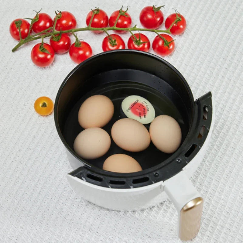 Egg timer in an egg boiler with eggs.