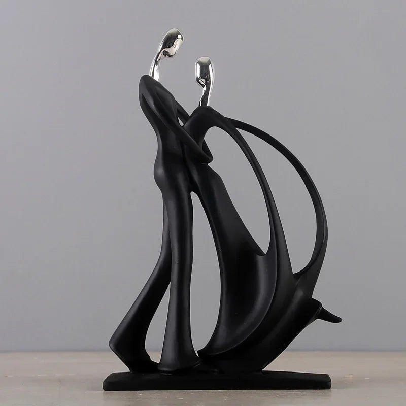 Black dancing figurine in motion.