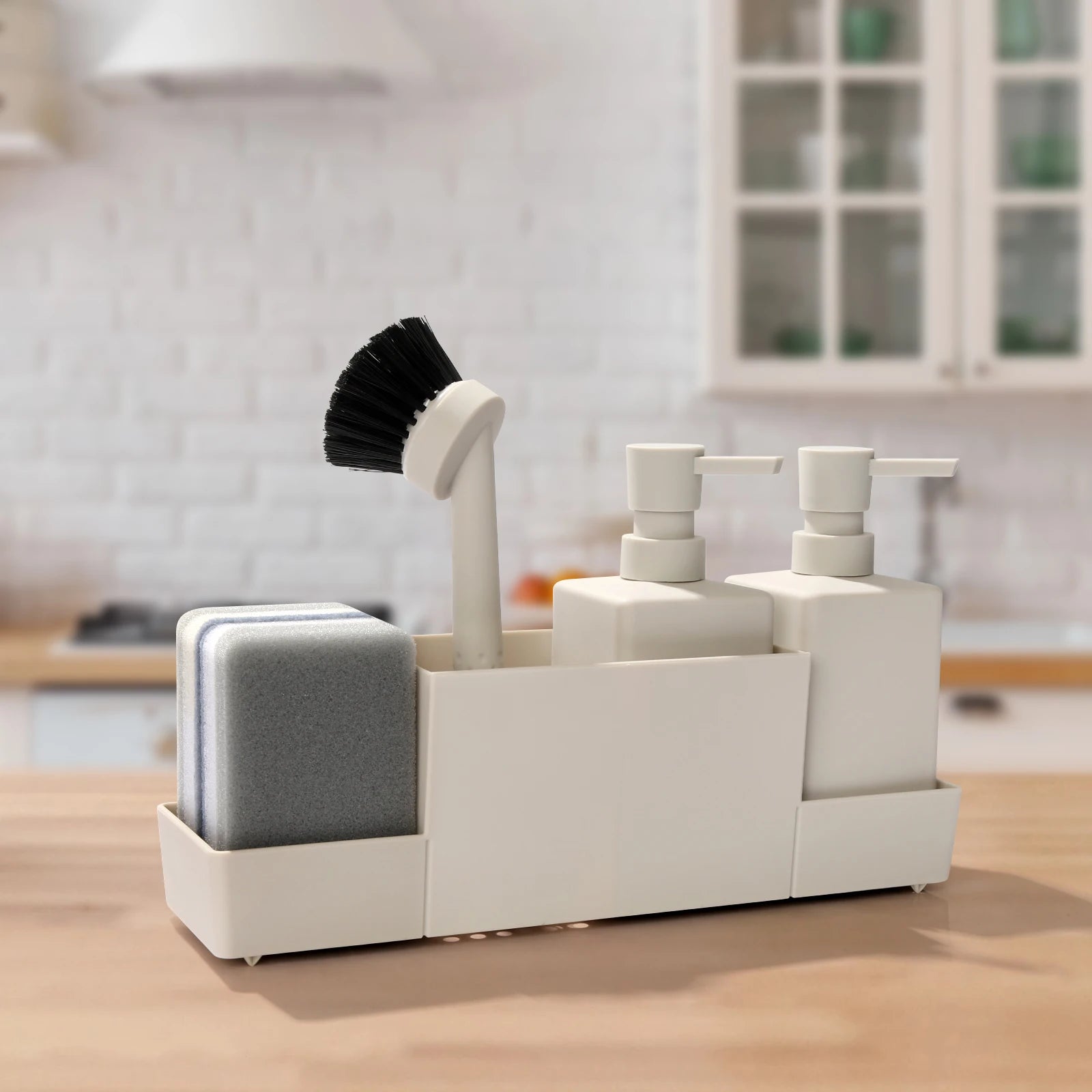 Beige sink caddy with sponge and brush on counter.