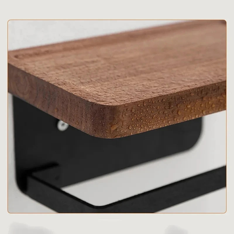 A wooden toilet paper holder with a black U-shaped arm, shown with dimensions.