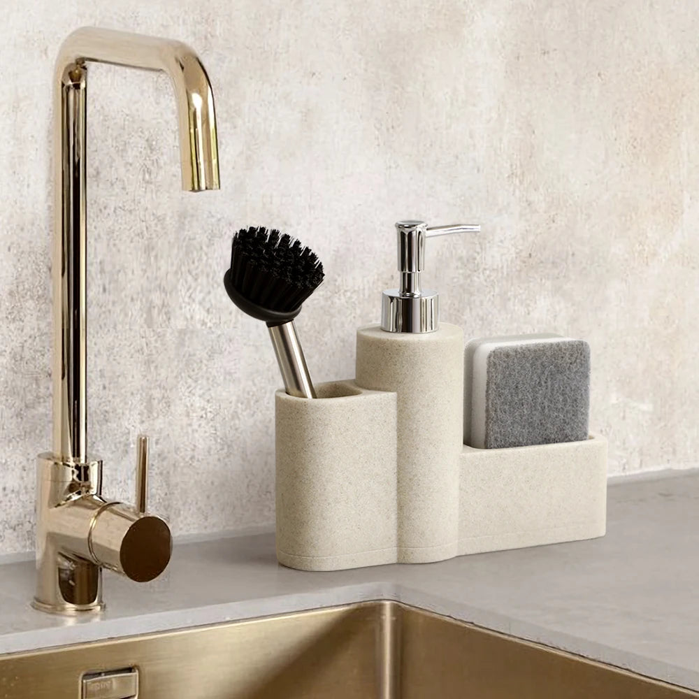 Beige textured dish soap dispenser set by a golden faucet.
