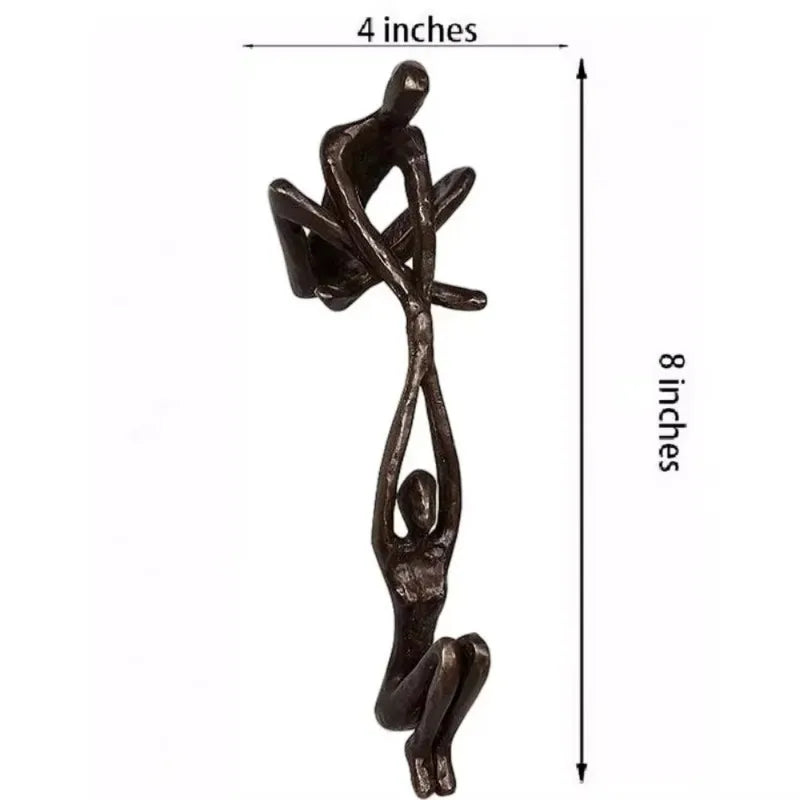 Measurement diagram of vertical hanging sculpture ornament with two figures.