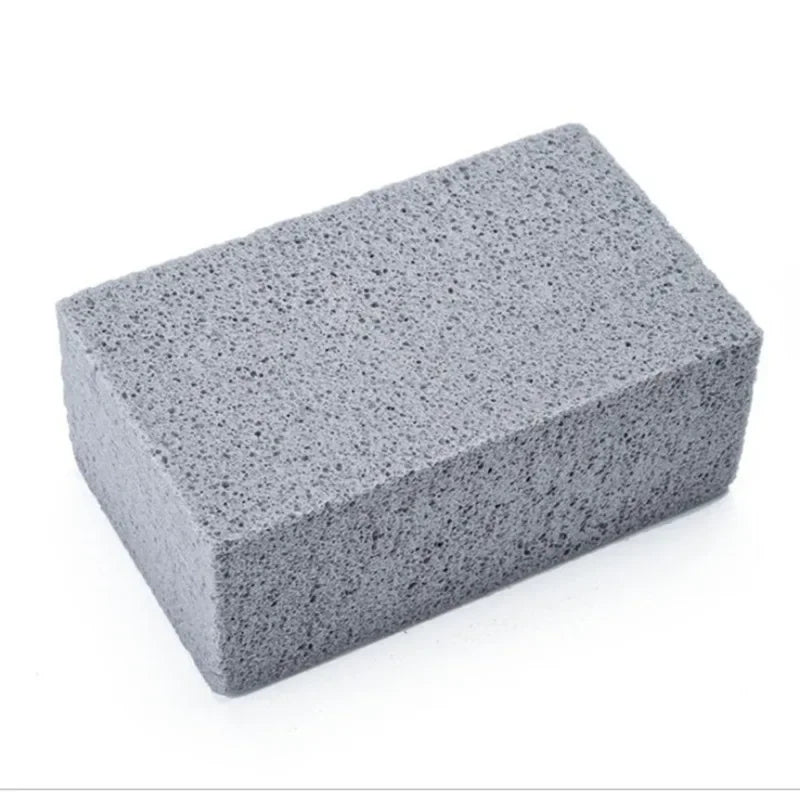 Grill cleaning brush with textured scrubbing surface.
