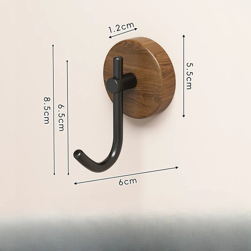 Wooden coat hook with a black metal arm, showing dimensions.