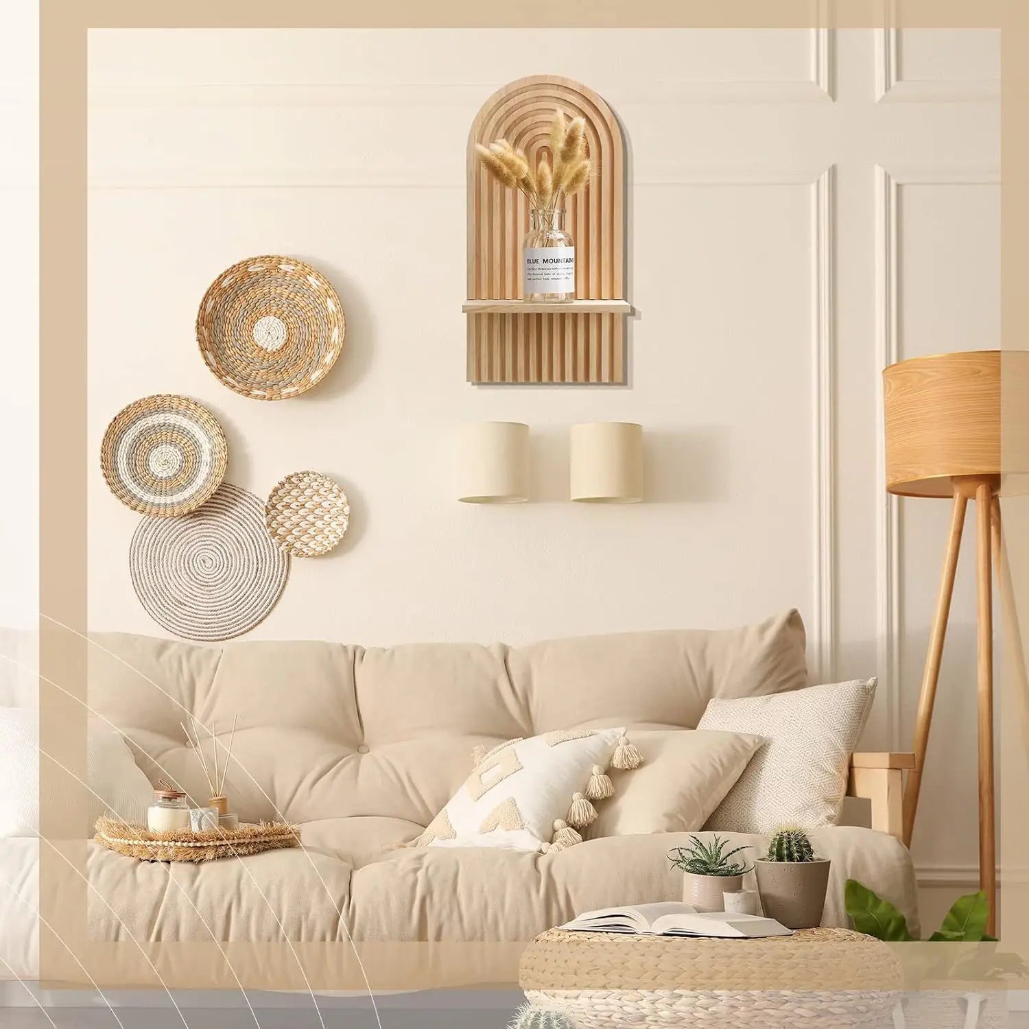 Boho shelf styled in a beige-toned living room above a couch.