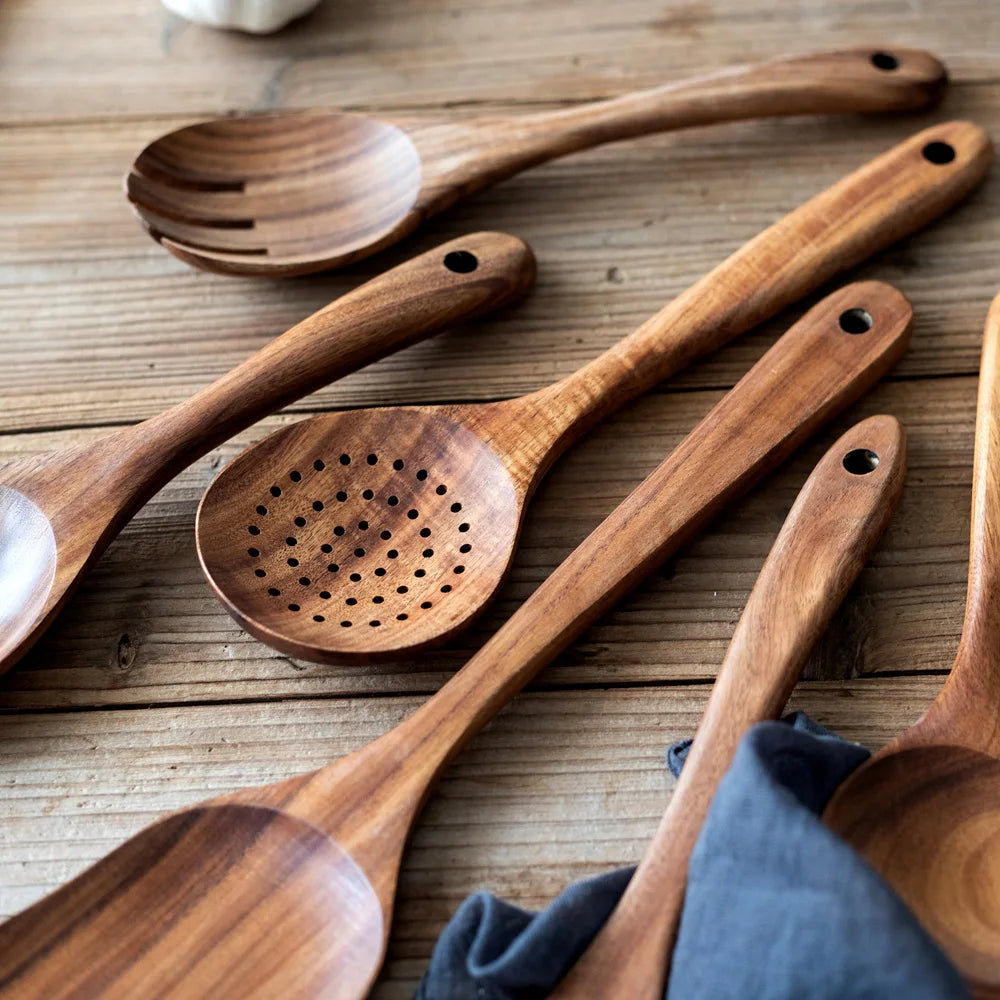 Wooden kitchenware set with close-up of textures and grains.