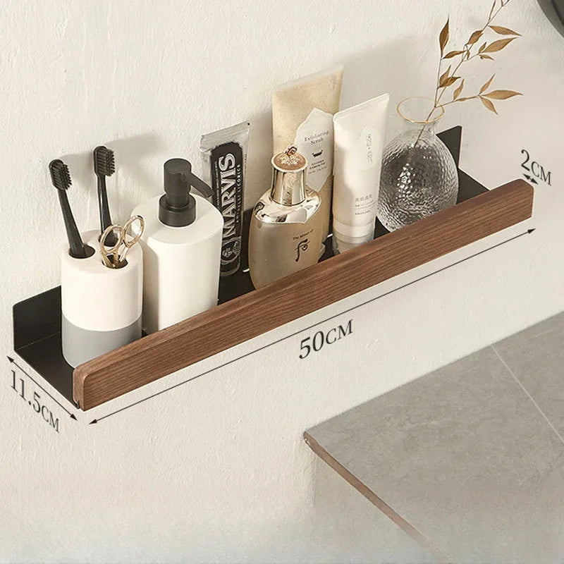 Floating wood shelf with bathroom toiletries, showing dimensions.