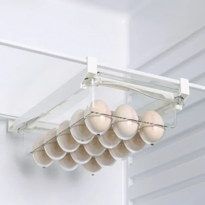 Refrigerator drawer with a row of eggs neatly placed under a fridge shelf.