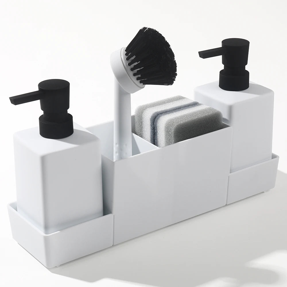 Sink caddy in white with dual dispensers, brush holder, and sponge compartment.